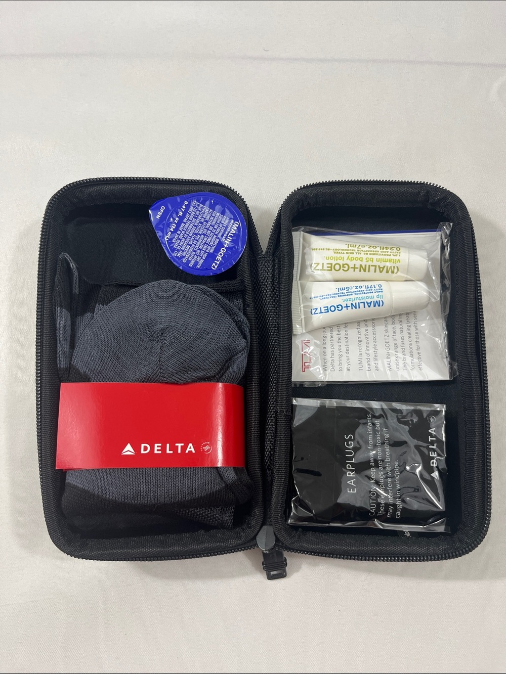 Tumi Accessory/Travel Case - Black - with Travel Samples - new with flaw